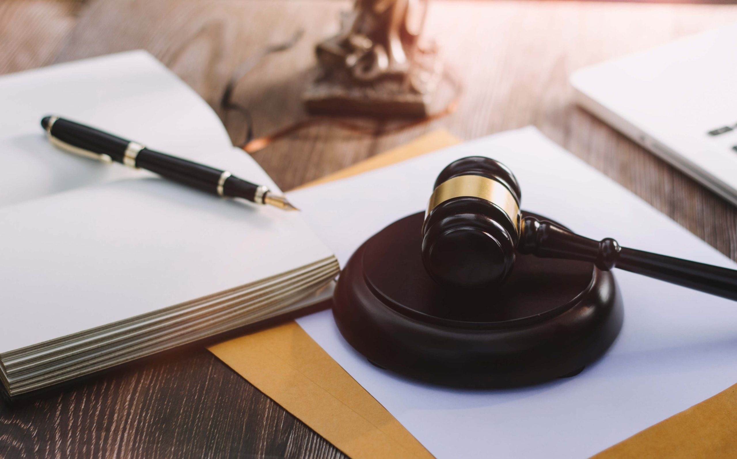 jpeg optimizer business lawyers discussing contract papers with brass scale desk office law legal services advice justice law concept picture with film grain effect scaled